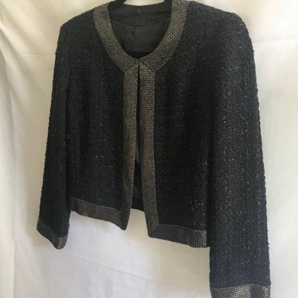 Metallic and knotted jacket